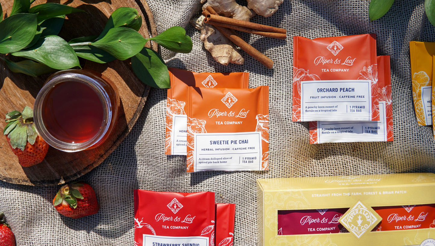 Box of 12 caffeine-free tea bags from Piper and Leaf Tea Co., featuring a variety of herbal and fruit tea flavors.
