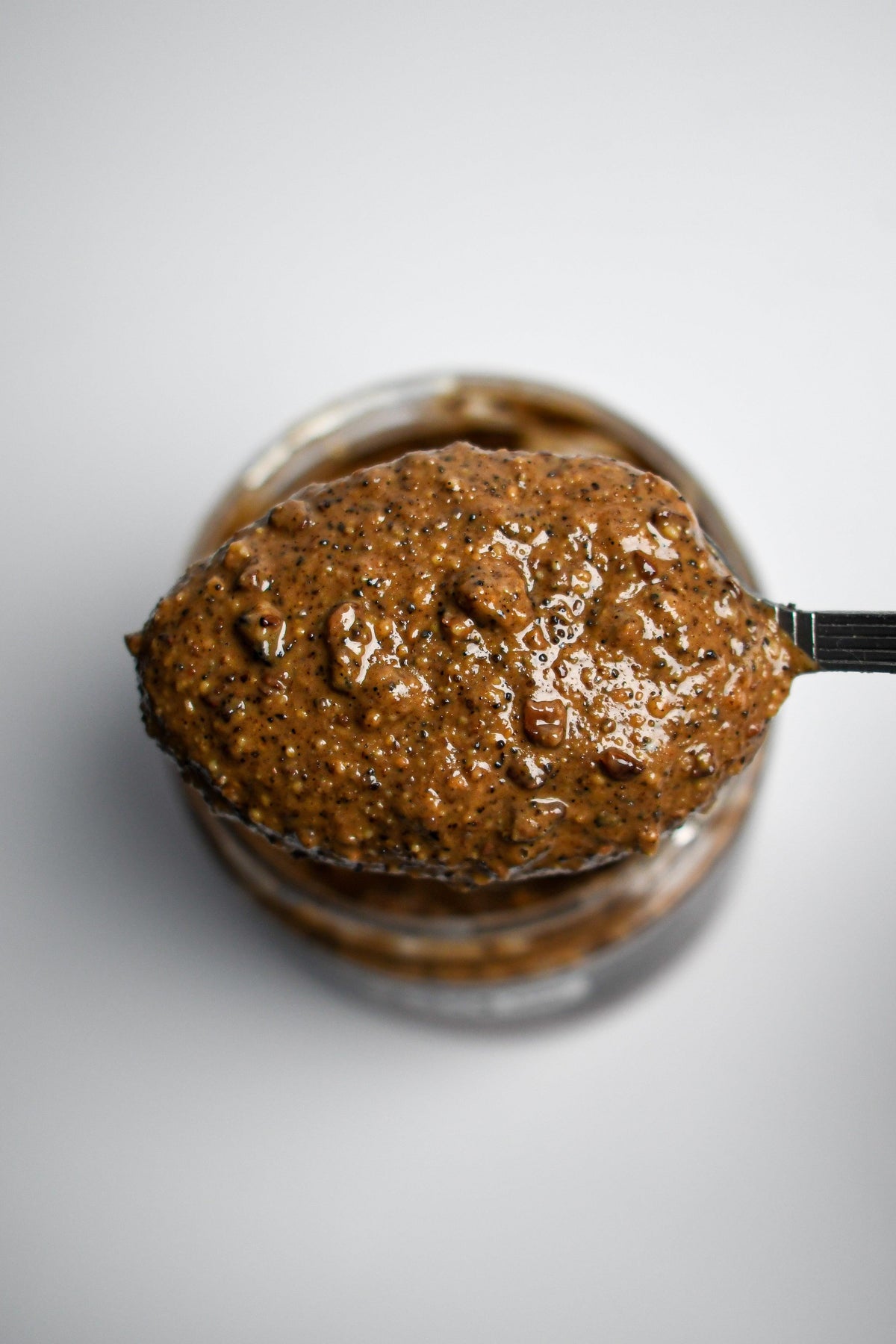 Creamy "Mud Season" nut butter by Mixed Up Foods featuring crunchy cacao nibs and coffee nuts in a 7.5 oz jar.