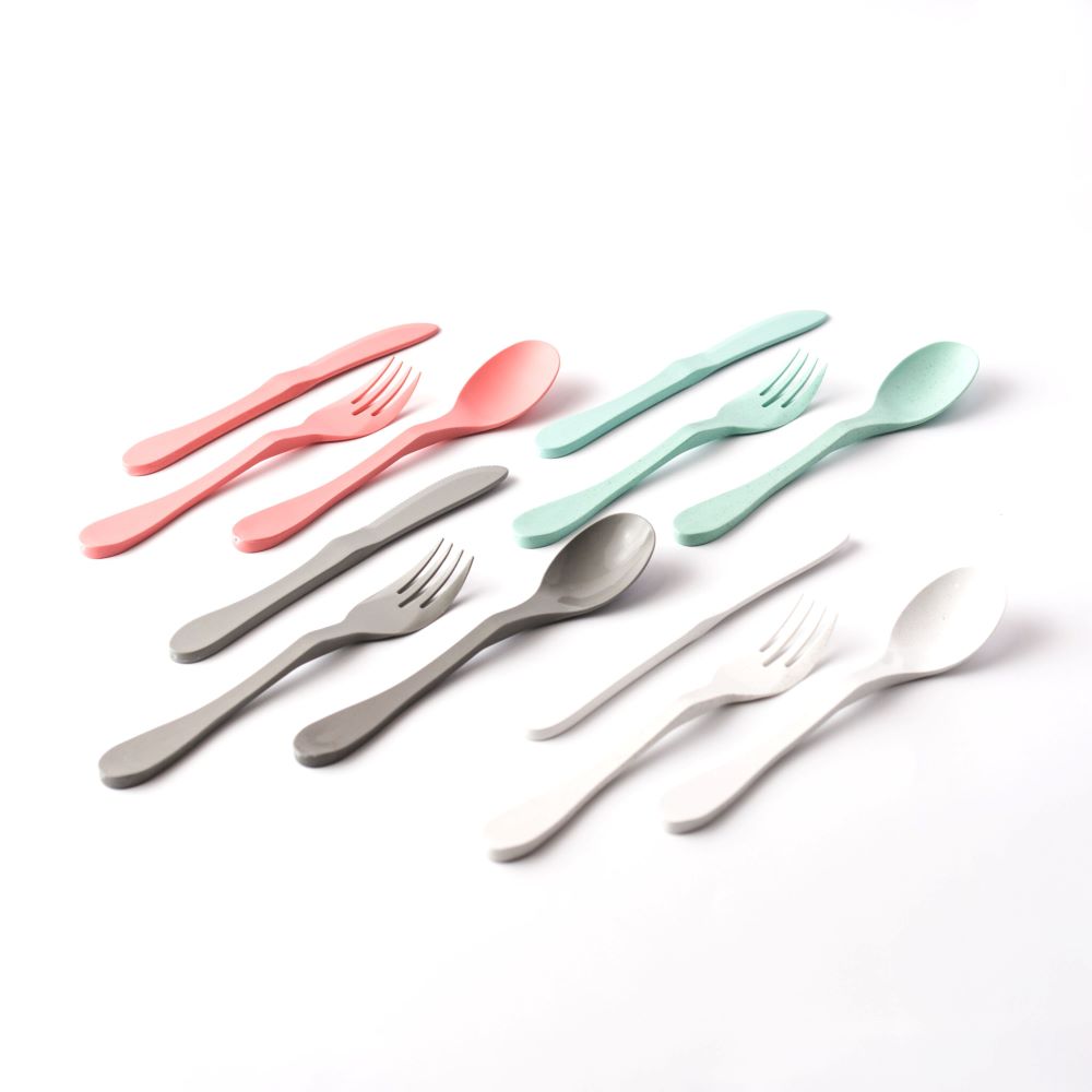Eco 12-piece cutlery set by Knork, including forks, knives, and spoons, arranged on a white background.