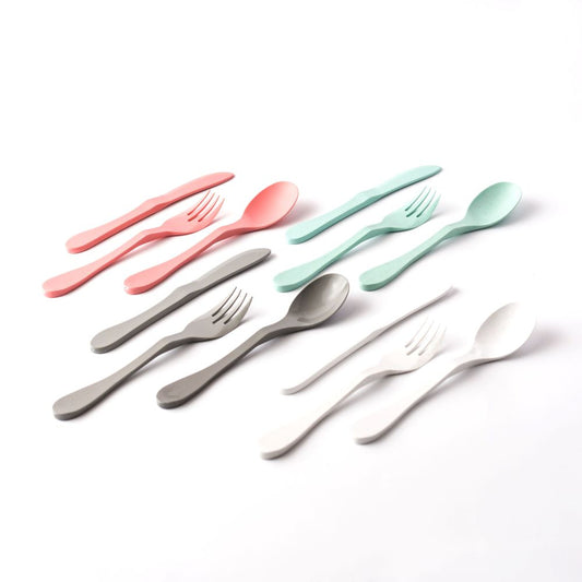 Knork Eco 12-piece cutlery set with forks, knives, and spoons arranged on a white background.