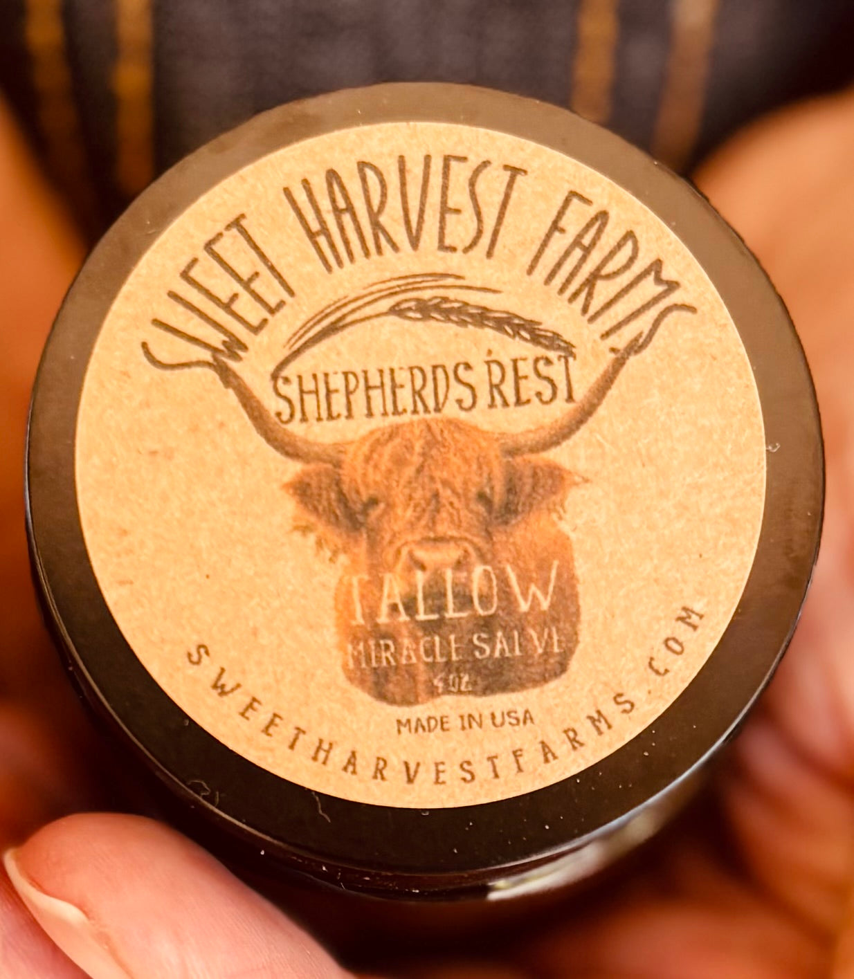 Organic Shepherds Rest Tallow Miracle Salve jar with label, showcasing natural ingredients and handcrafted packaging.