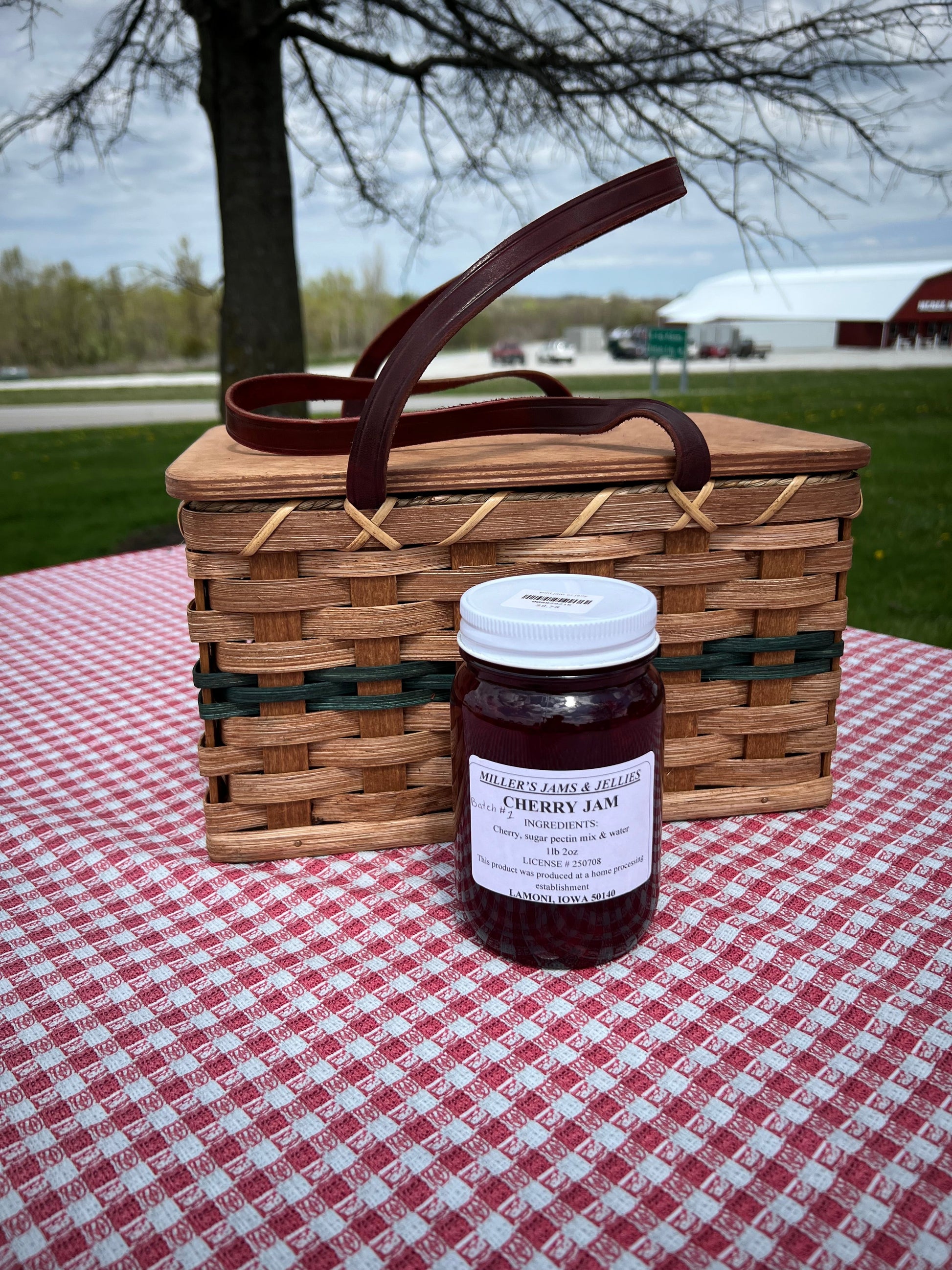 Amish Country Store Miller's Cherry Jam jar, homemade Amish jam with fresh cherries, local Amish-made preserve in glass jar.