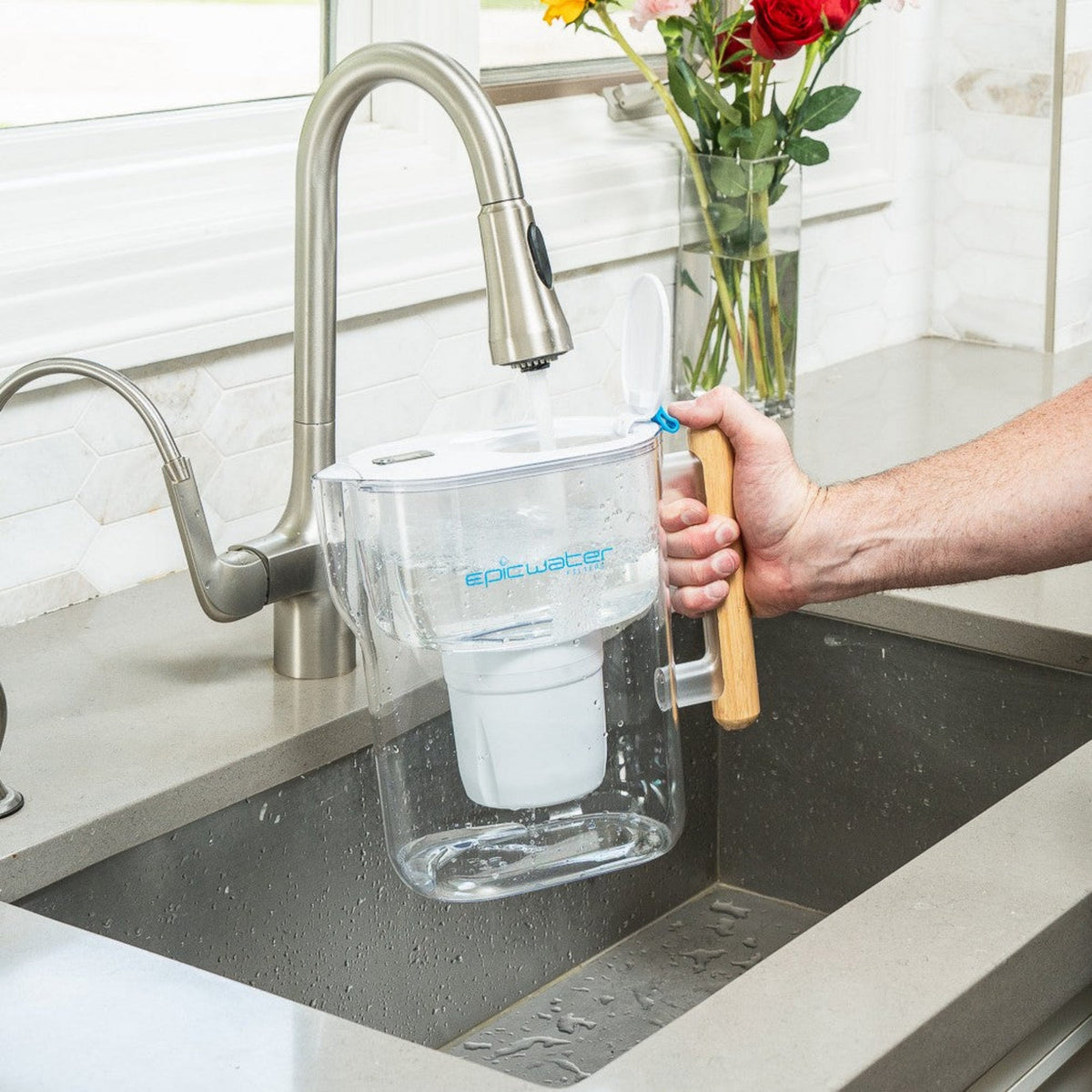 Epic Water Filters Pure XP pitcher with red lid, showcasing the sleek design for reducing fluoride, PFAS, and parasites in drinking water.