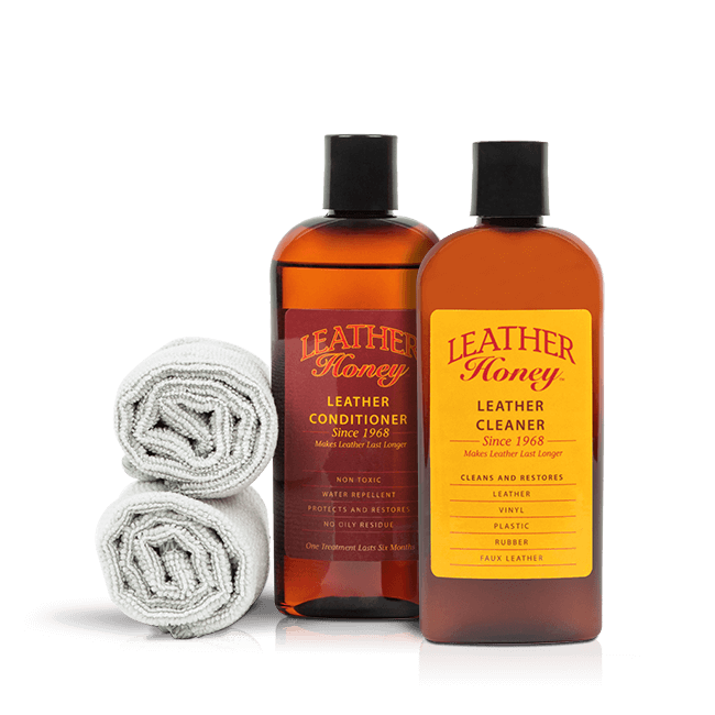 Leather Honey Leather Care Kit with 8oz conditioner, 8oz cleaner, and cleaning cloth for maintaining leather furniture and accessories.