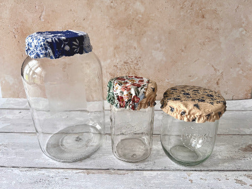 Farmhouse-style jar covers from Five Oaks Farm, decorative and functional lids for preserving jars.