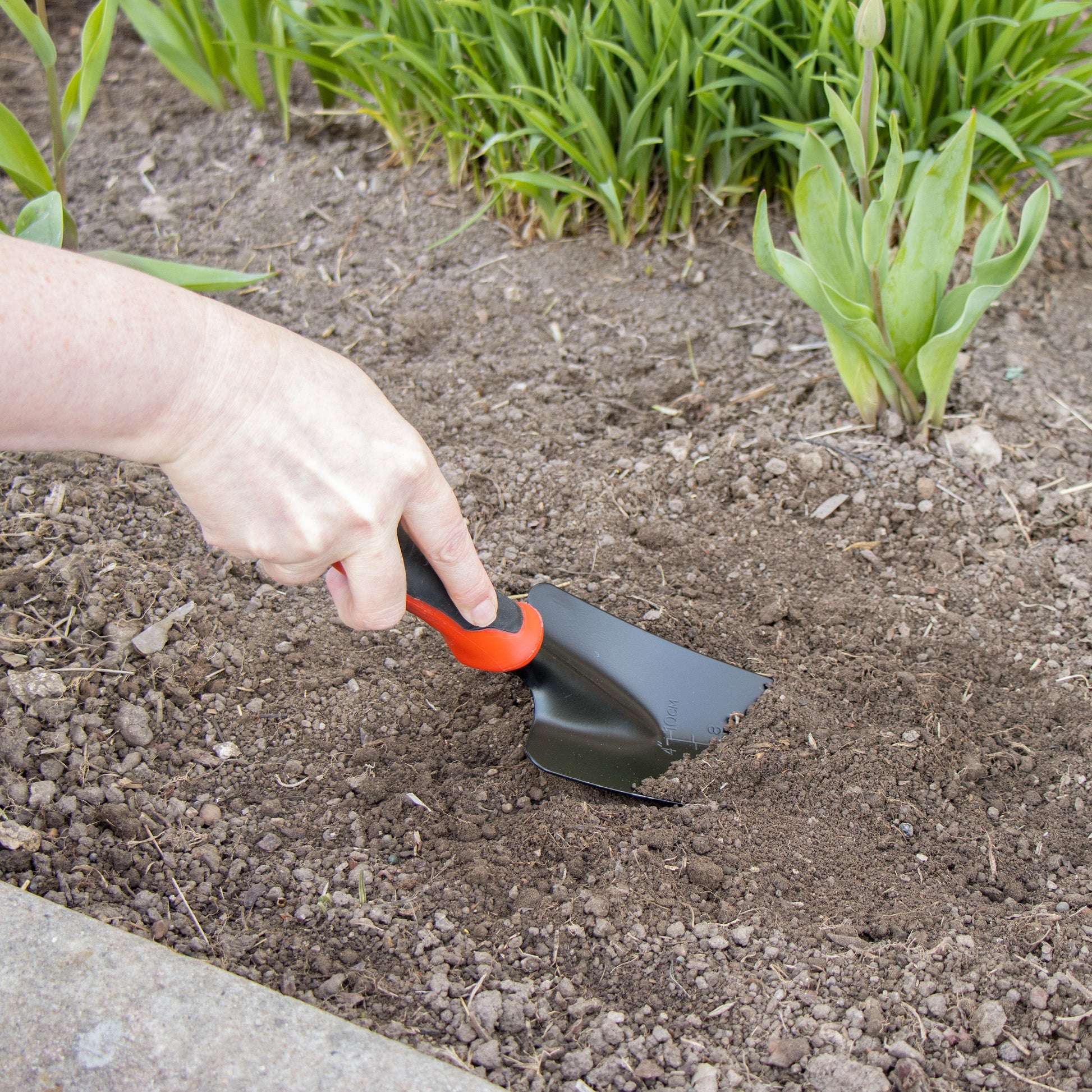 Orbit Irrigation Easy Grip Trowel garden tool with ergonomic handle and sturdy metal blade for planting and digging tasks.