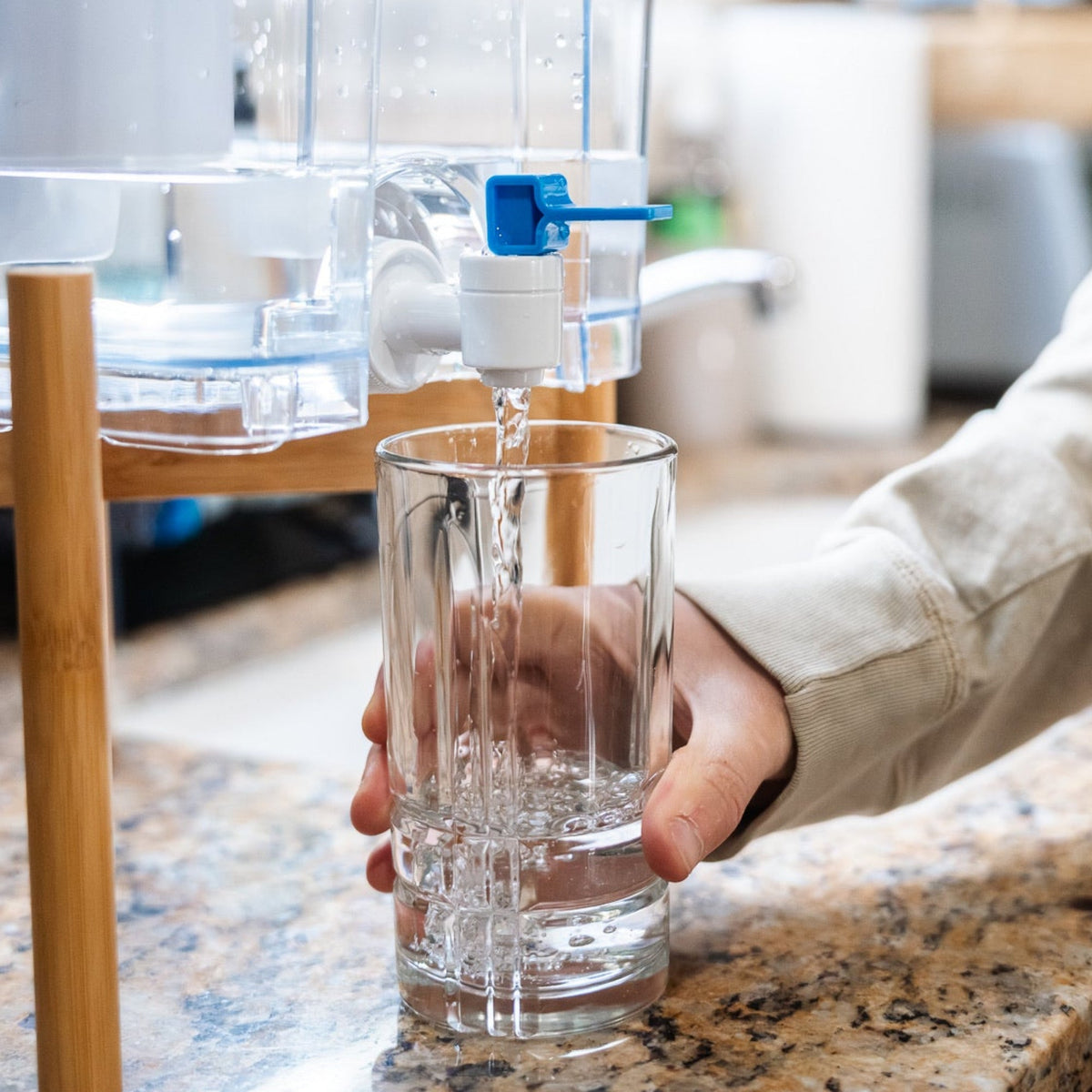 Epic Water Filters USA Pure XP Dispenser in red, designed to reduce fluoride and PFAS from drinking water.