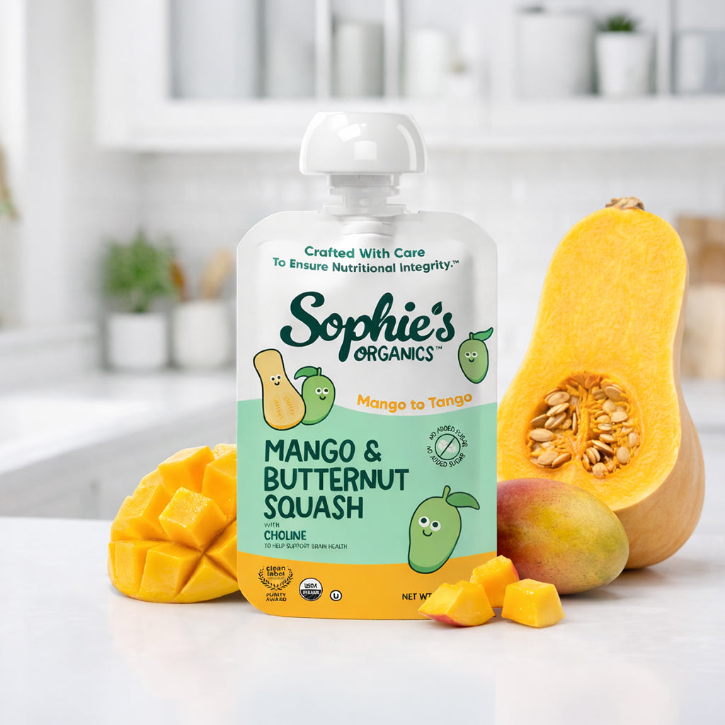 Six-pack of Sophie's Organics Mango To Tango fruit snacks displayed in a colorful, playful packaging scene.