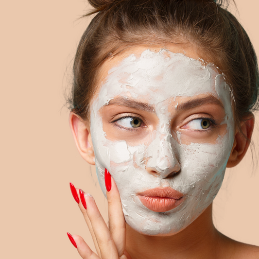 Taylor Made Organics acne face mask shown with a woman applying the natural skincare mask to her face.