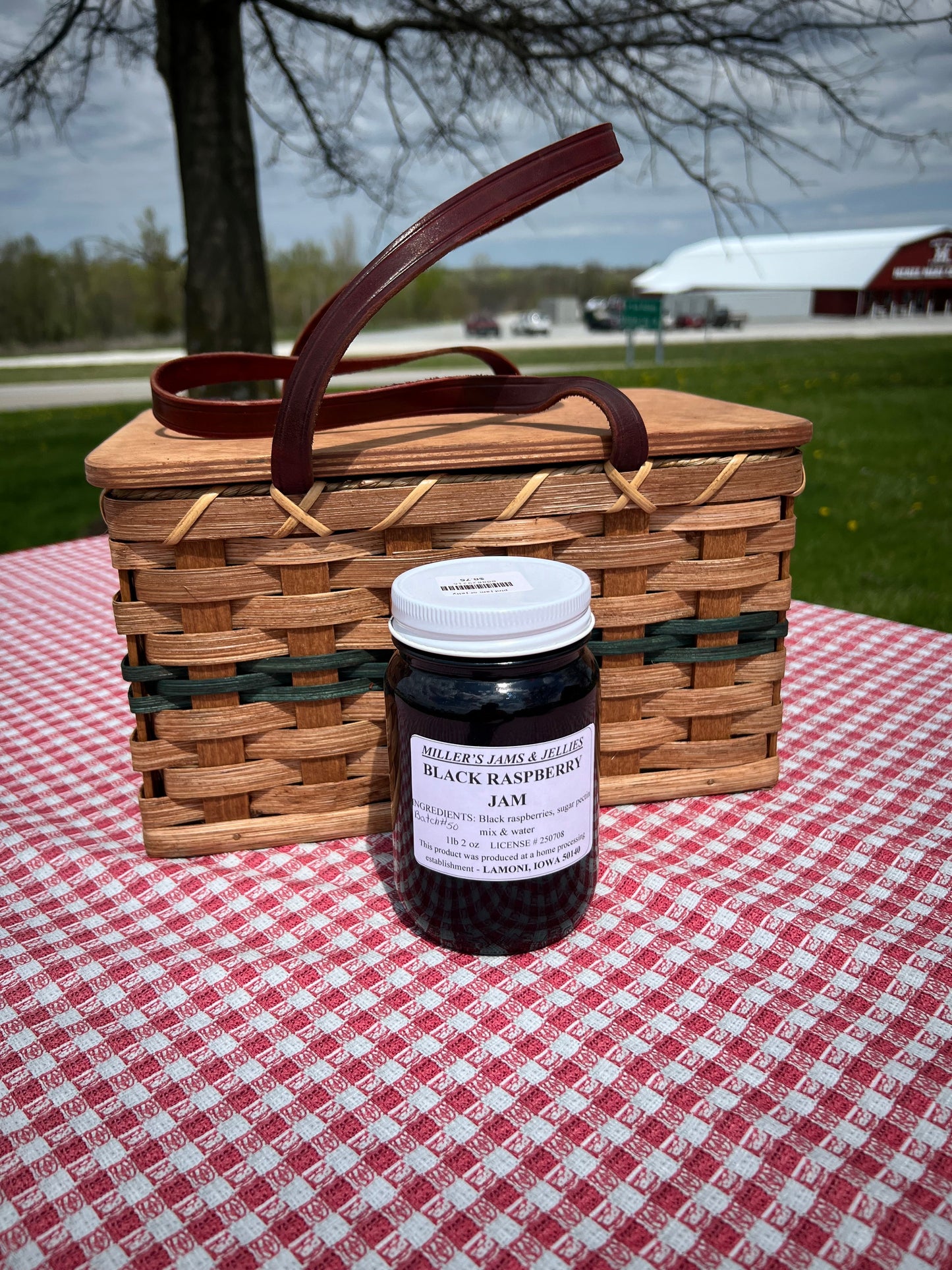 Amish Country Store Black Raspberry Jam jar with label, showcasing the Amish-made Amish jam in a glass jar.