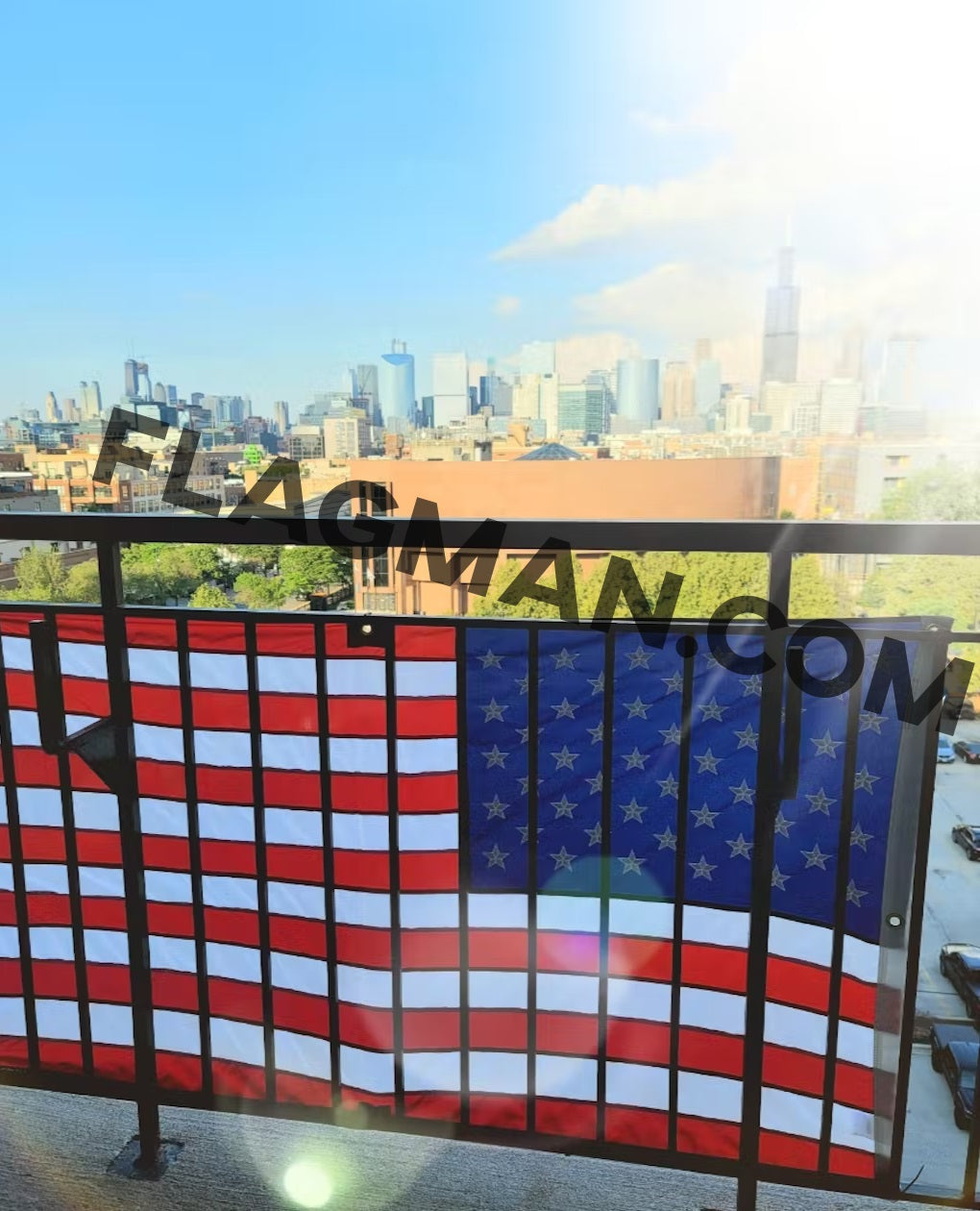 Nylon American flag wall-mounted with reinforced edge grommets, displayed on balcony, made in USA by Flagman of America.