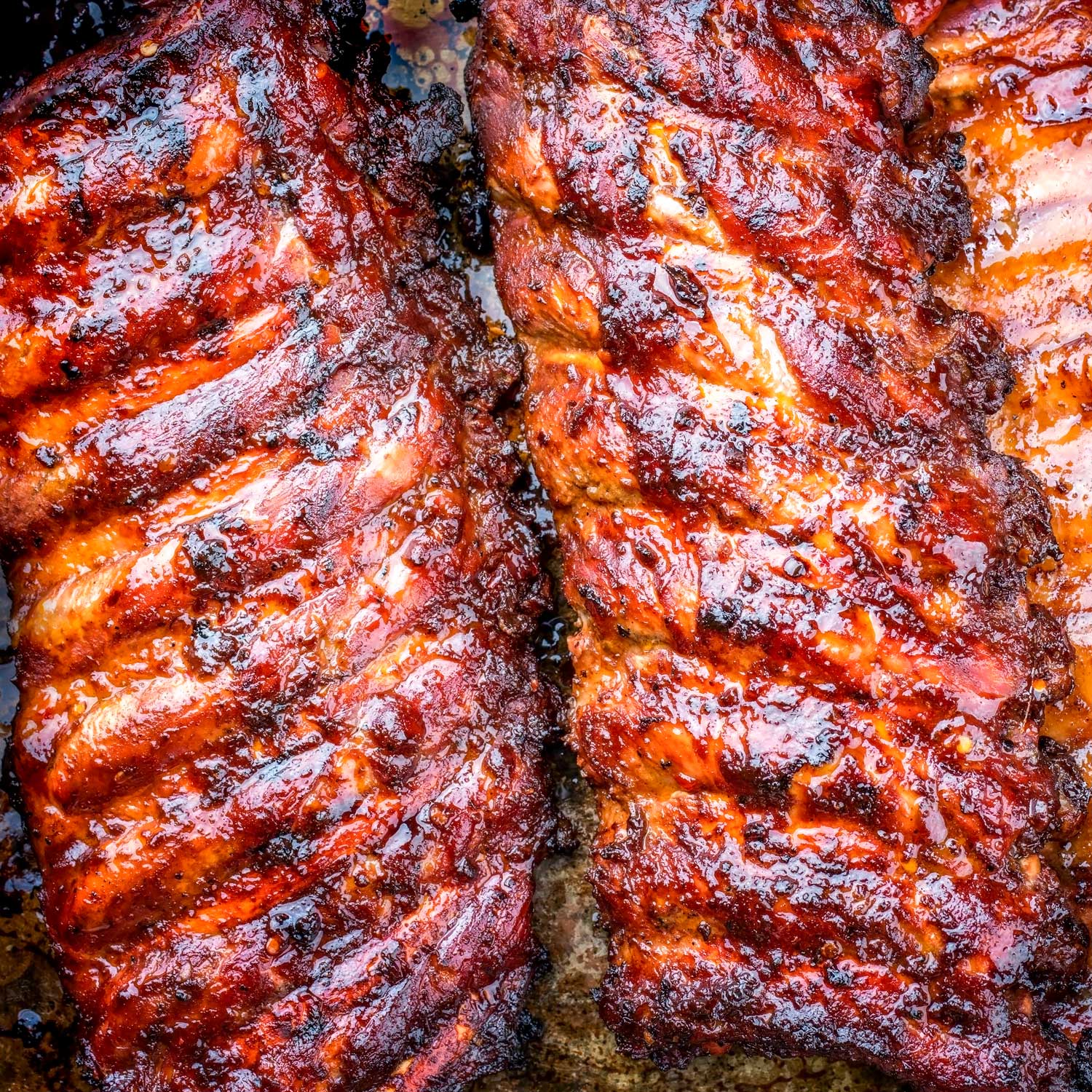 Build-a-Rib Package from Pig of the Month BBQ featuring juicy, tender baby back ribs perfect for BBQ meat lovers.