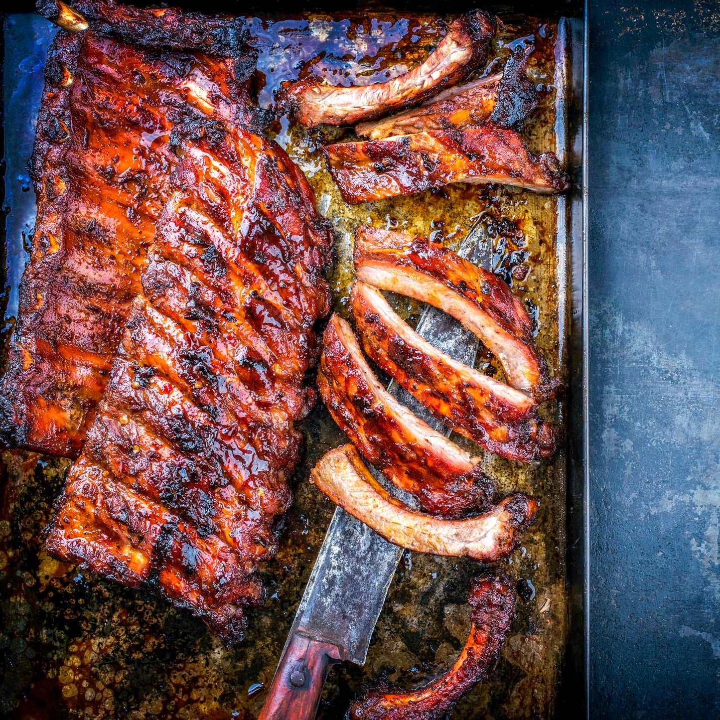 Award-winning Pig of the Month BBQ Build-a-Rib Package featuring juicy, tender baby back ribs ready for nationwide shipping.