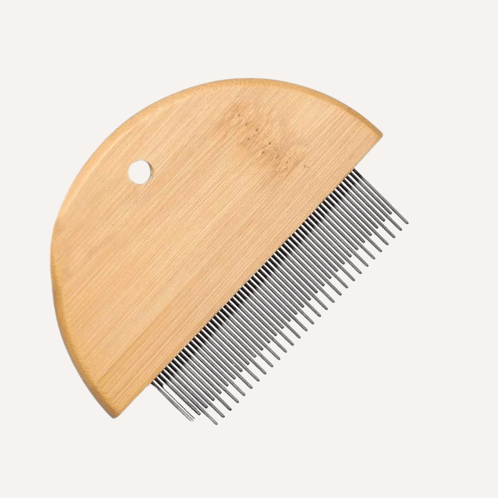 Bamboo flea and detangler comb for dogs and cats, eco-friendly grooming tool from Tilley + Me with fine teeth for gentle pet grooming.