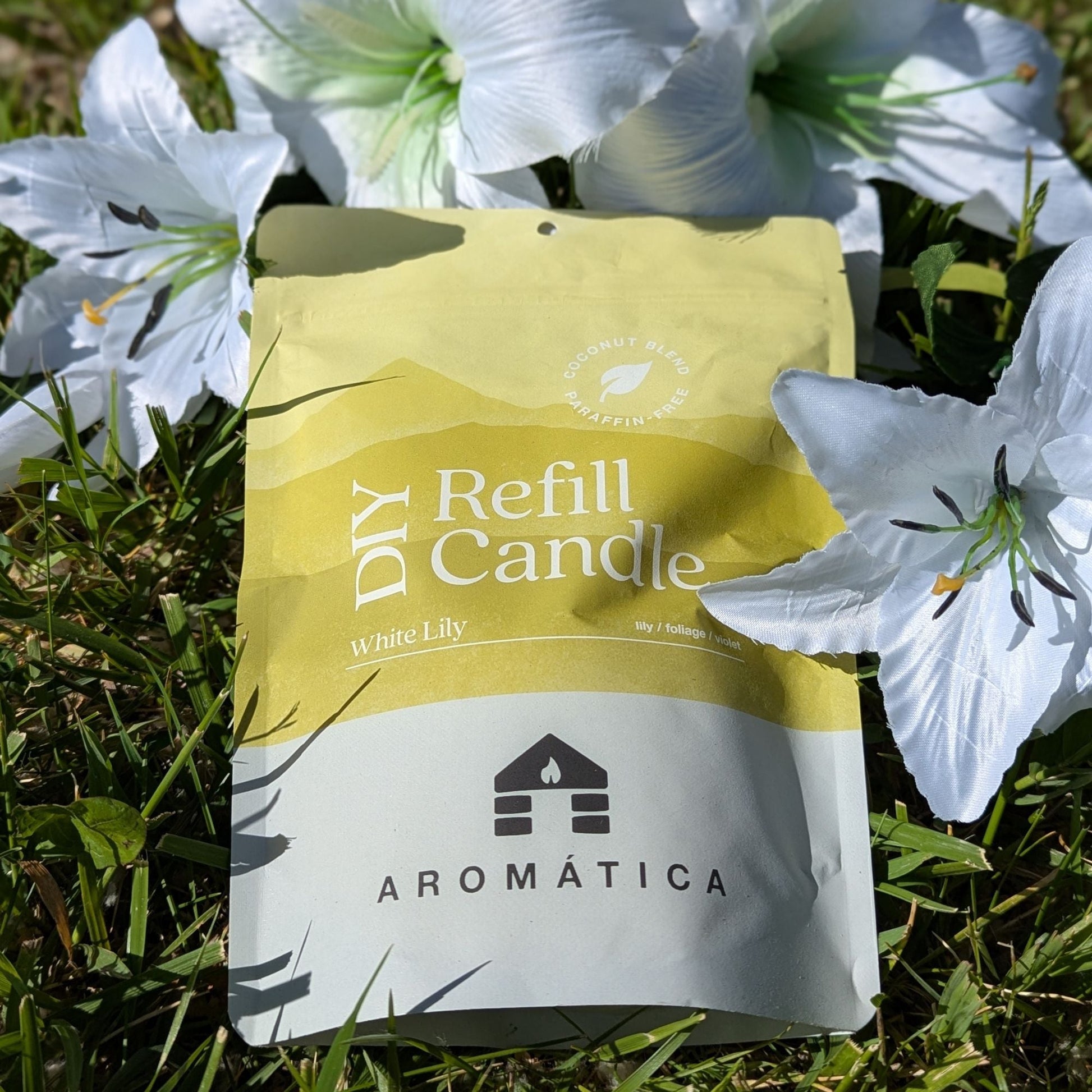 Bluecorn Candles Aromática scented candle refill kit with white lily coconut wax candles in a white container.