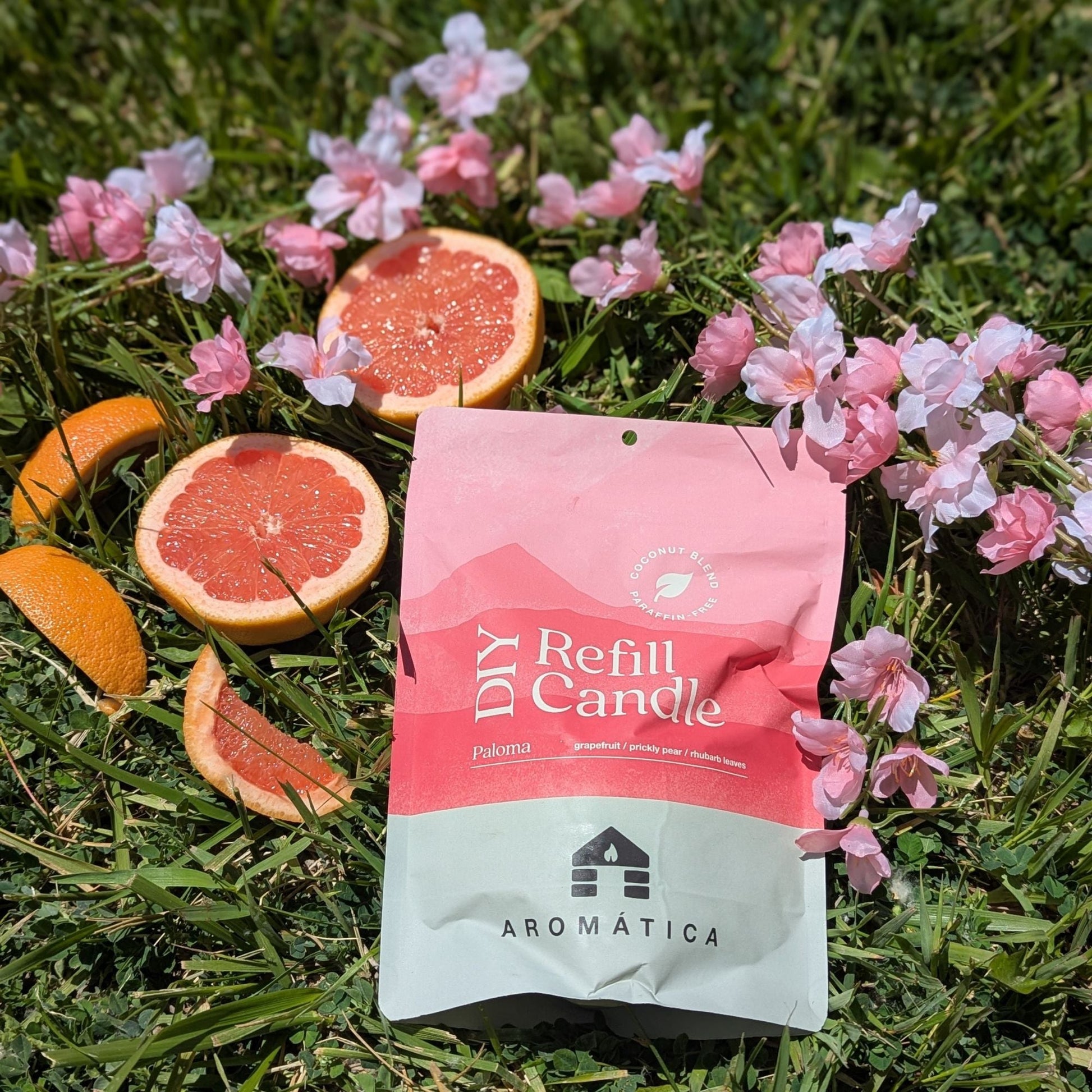 Bluecorn Candles Aromática scented candle refill kit with grapefruit scent, featuring natural wax and refillable container.
