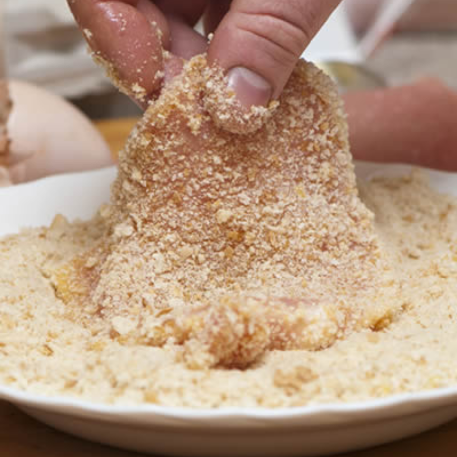Cooper's Best Breading Mix in a 2.5 lb bag, used for coating foods, with a golden, textured appearance in the image.