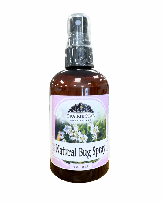 Spray bottle of Prairie Star Botanicals natural bug spray for outdoor use, featuring a clear label and spray nozzle.