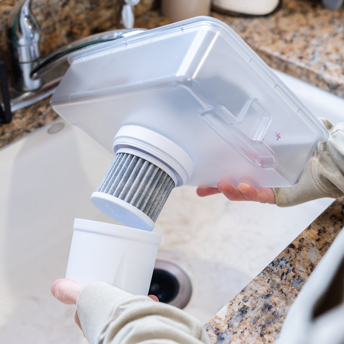 Epic Water Filters Pure XP Dispenser in red for reducing fluoride and PFAS from filtered water.