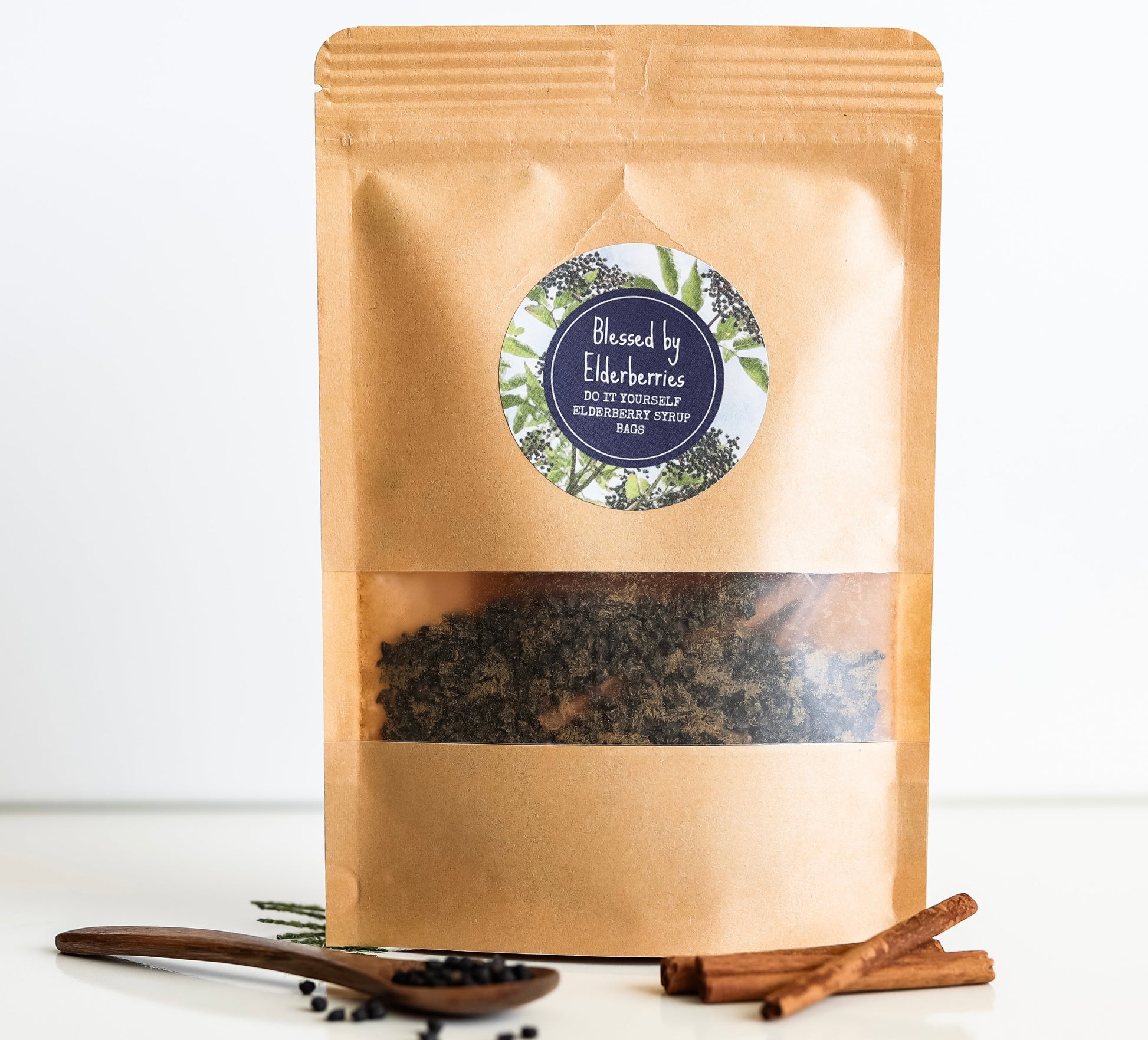 All-natural DIY quart-sized elderberry syrup kit by Blessed by Elderberries, featuring ingredients for making elderberry tea.