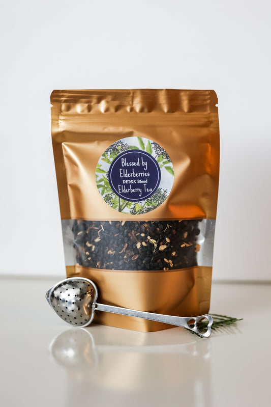 Dried elderberries for detox blend elderberry tea by Blessed by Elderberries in a clear jar, ready for brewing.
