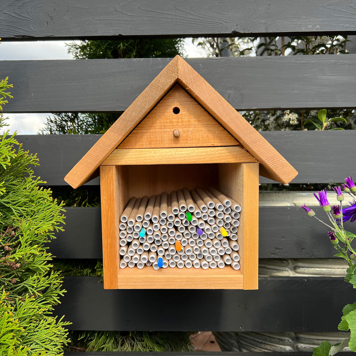 Cedar bee house with bee tubes, inserts, and wayfinders for pollinators, by CrownBees.
