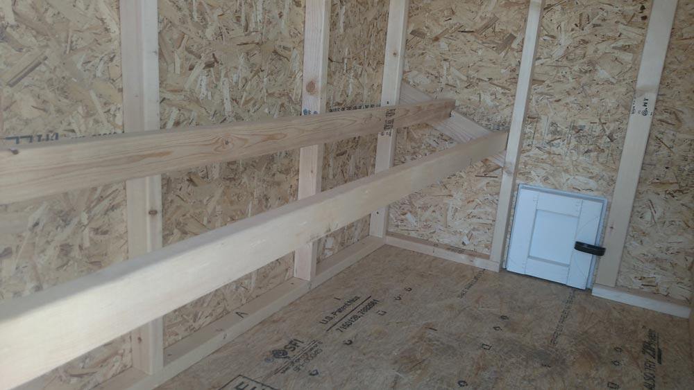 OverEZ large chicken coop with a spacious roosting area designed for up to 15 chickens, featuring sturdy wood construction and ample space
