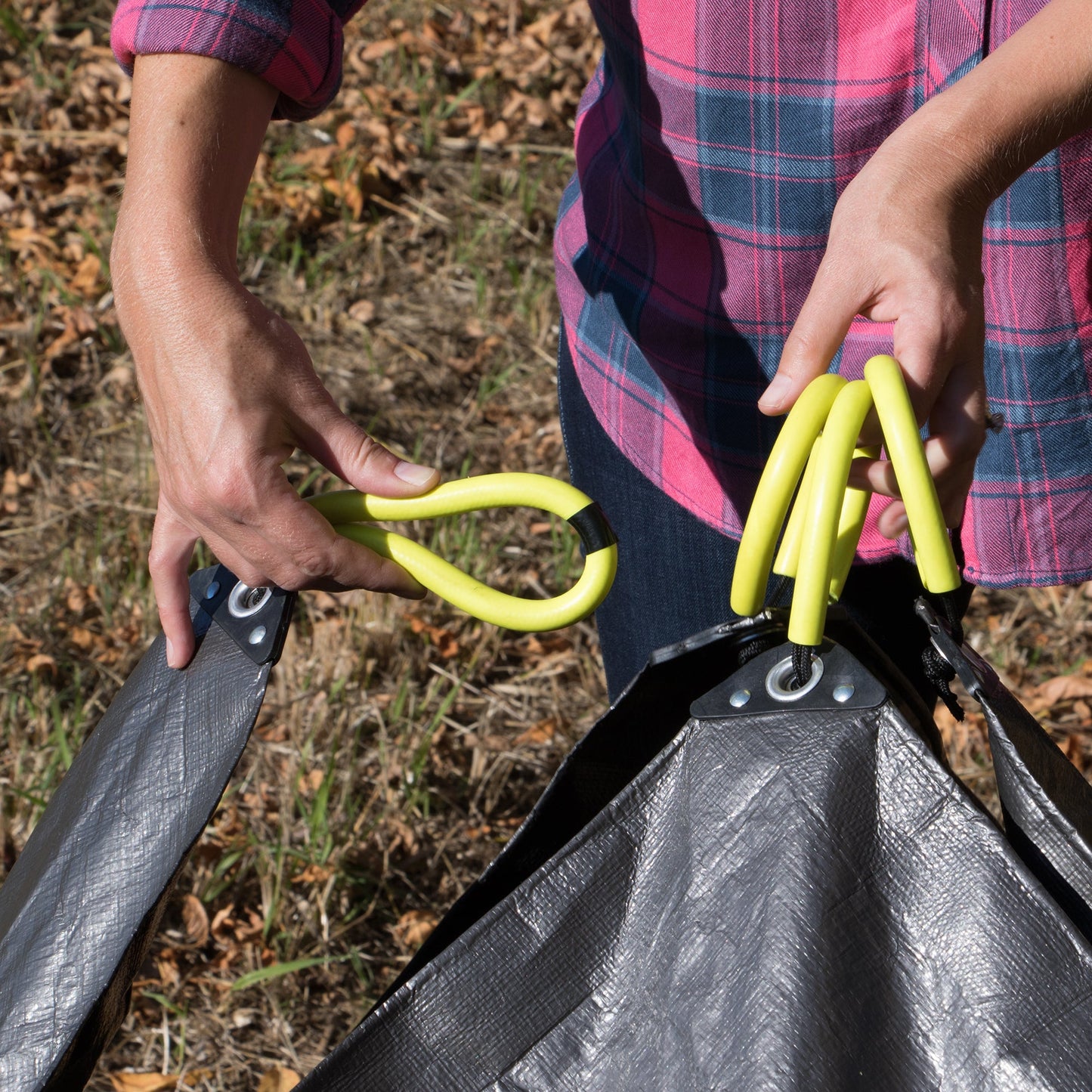 Allsop Home & Garden Clean-Up Canvas with cleaning tools and supplies on a work surface, ready for organization or maintenance.