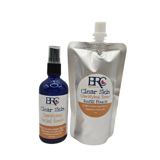 By Robin Creations Clear Skin Acne Clarifying Facial Toner Spray in a refill bottle, designed to help reduce acne and clear skin.
