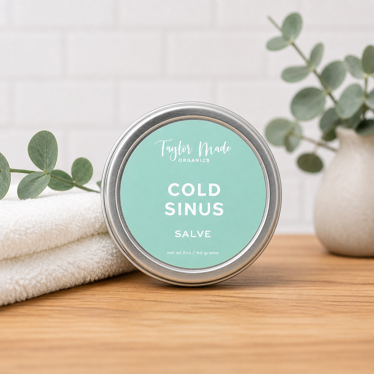Tube of Taylor Made Organics Cold & Sinus Organic Salve showing the herbal-infused therapeutic balm for nasal relief.