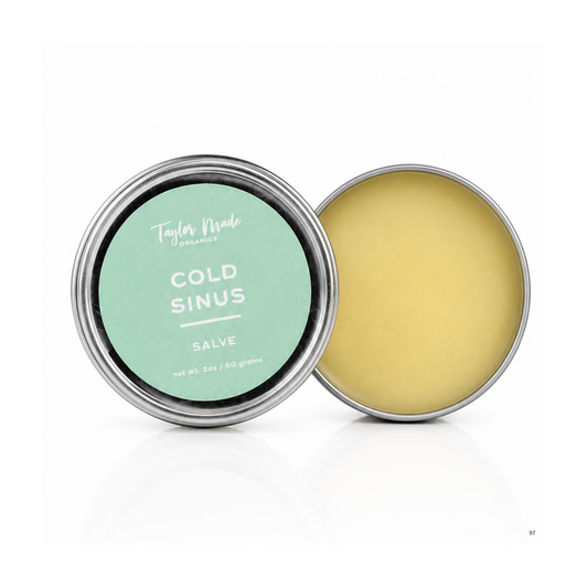 Inside view of Taylor Made Organics Cold & Sinus Organic Salve, a therapeutic herbal salve in a small jar with a natural, creamy texture.