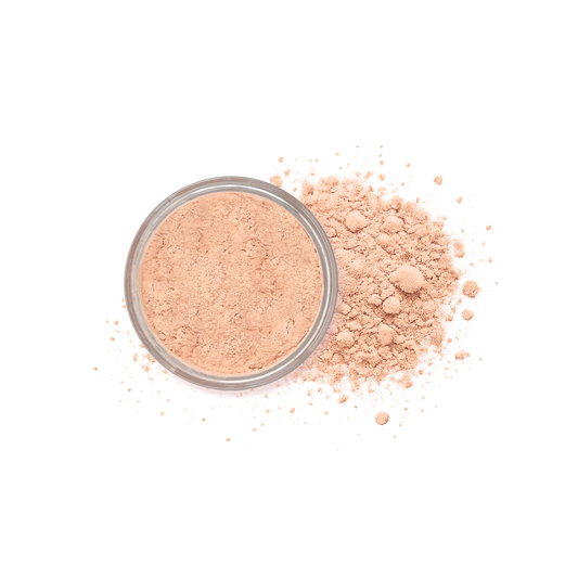 Cool fair loose mineral foundation by Taylor Made Organics, showing the powder in a natural shade container.
