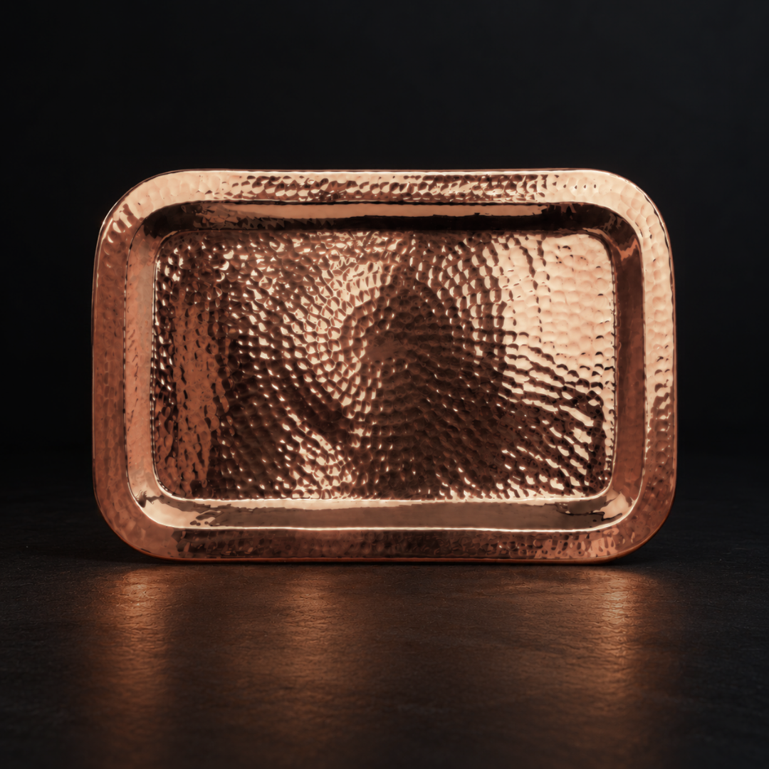 Sertodo copper Charolita tray with a polished surface, designed as a decorative plate or platter for serving or display.