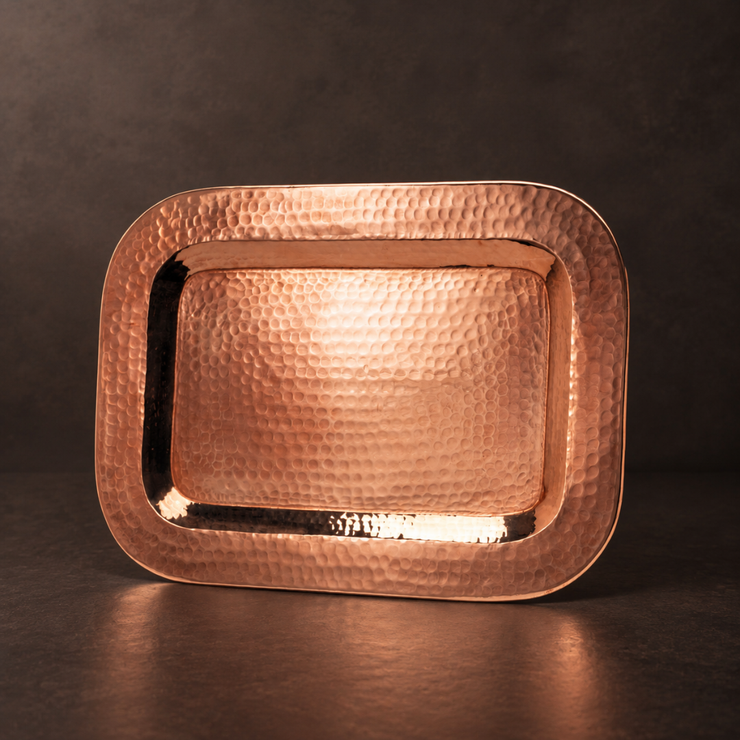 Copper Thessaly rectangle platter by Sertodo, showcasing a handcrafted copper plate with a smooth, polished finish and rectangular shape.