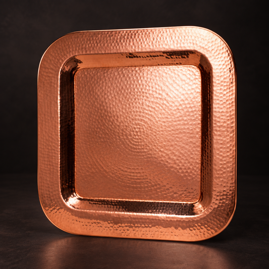 Copper Thessaly square platter by Sertodo, showcasing a polished copper plate with a square shape and decorative edges.