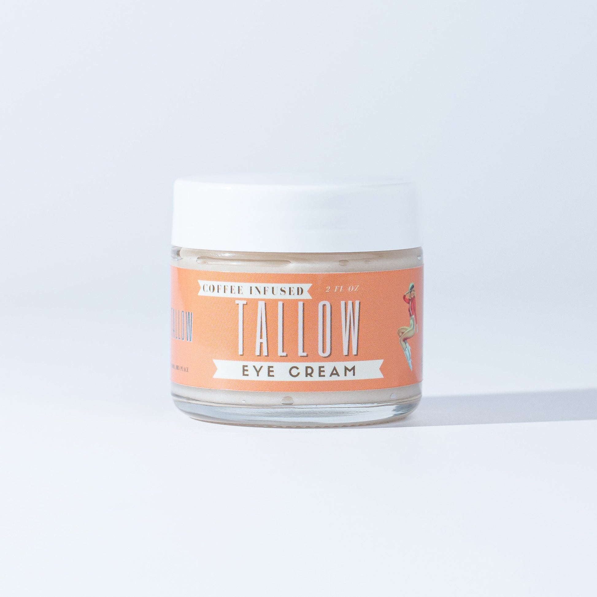 Lady May Coffee-Infused Tallow Eye Cream in a jar, designed to brighten, firm, and revitalize the delicate eye area naturally.