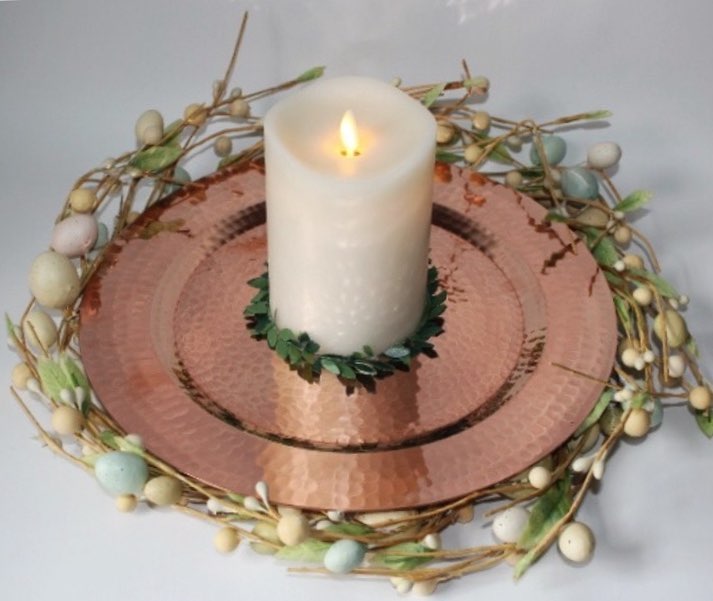 Copper Thessaly round platter by Sertodo, showcasing a polished, circular plate with a warm, copper finish and smooth edge.