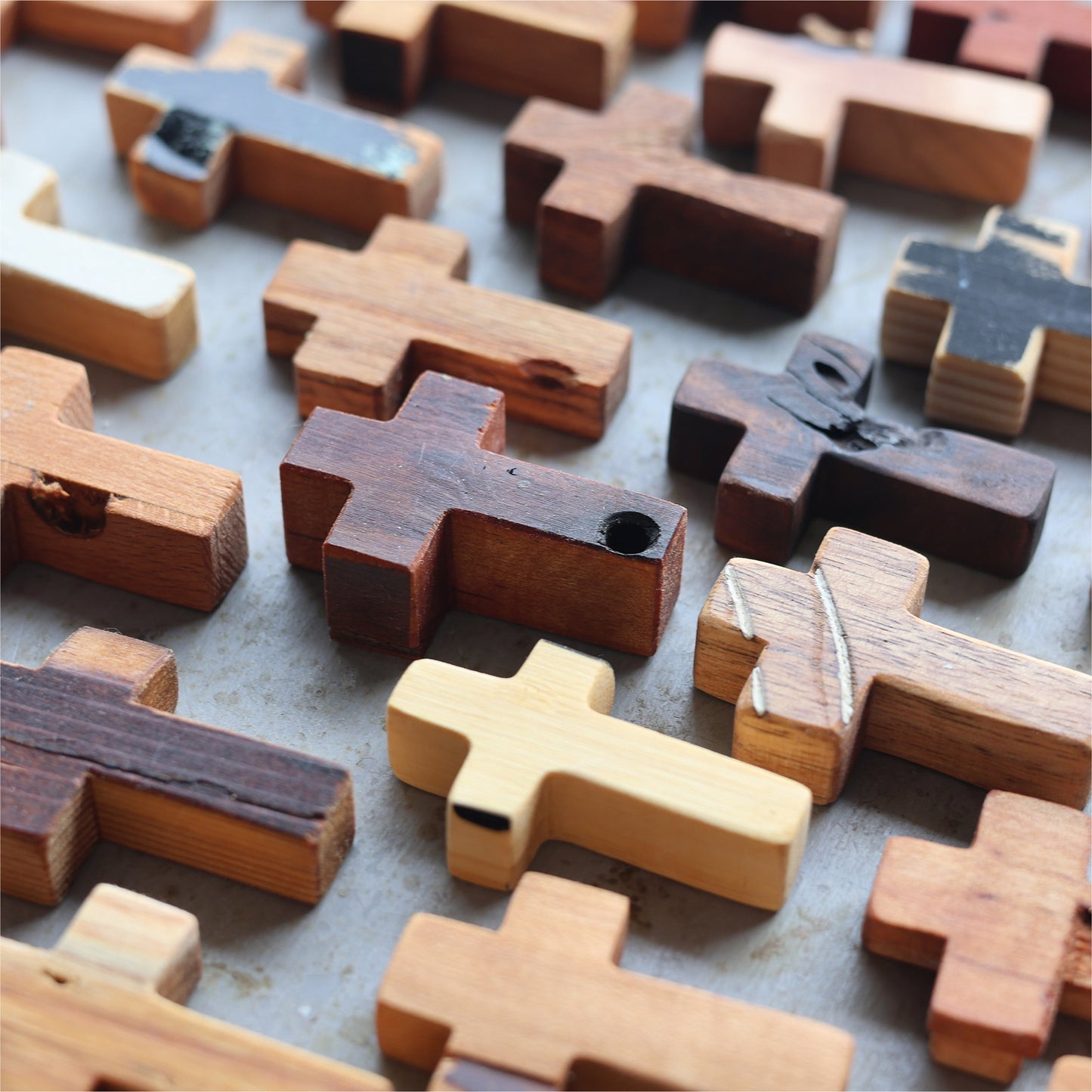 Wooden cross necklace from Dennehey Design Co. featuring a rugged pocket cross design, ideal for everyday wear.