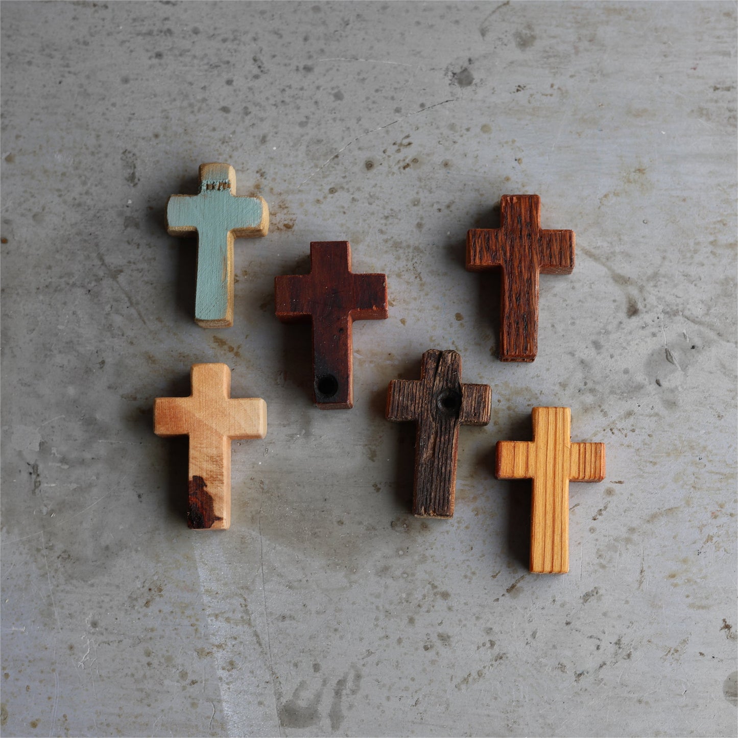 Wooden Cross necklace from Dennehey Design Co. featuring a rugged, handcrafted pocket cross with detailed woodgrain.