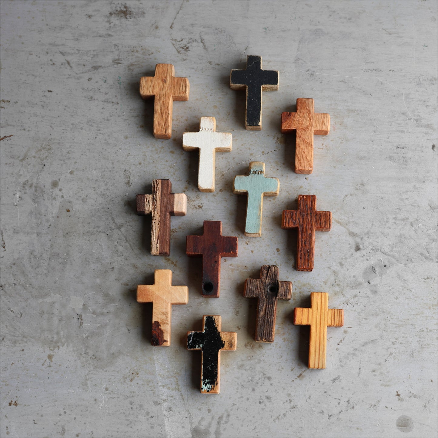 Wooden cross pendant from Dennehey Design Co.'s Rugged Pocket Crosses collection, featuring a detailed, handcrafted design.