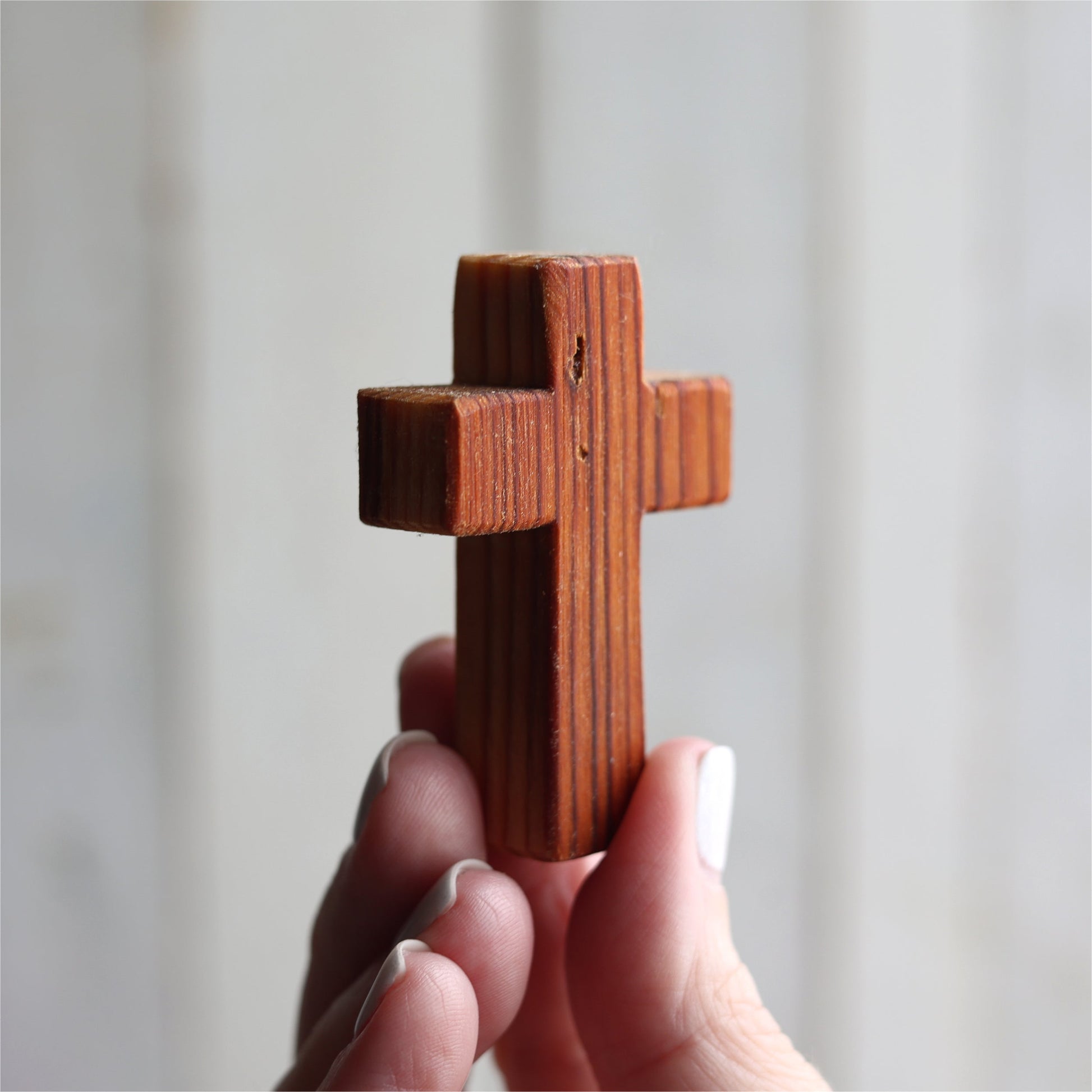 Wooden Cross necklace from Dennehey Design Co. featuring a rugged pocket-style wooden cross on a chain.