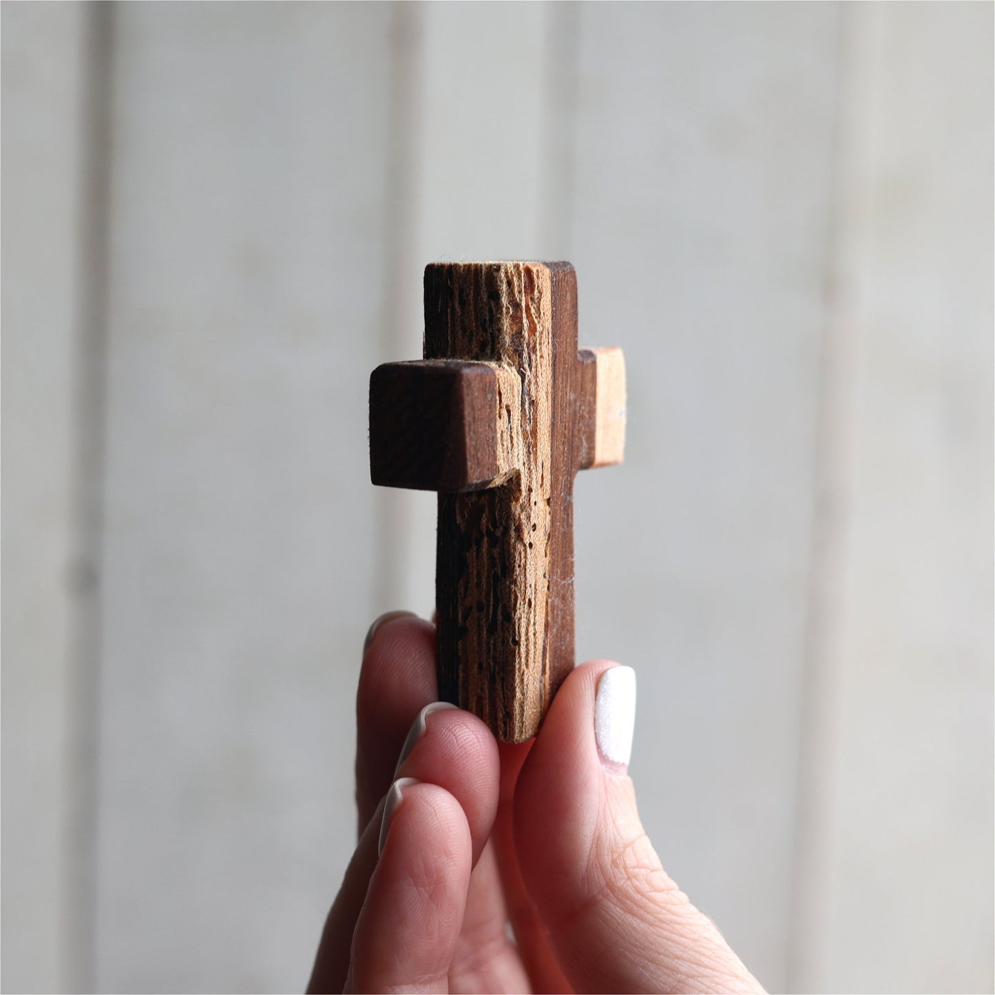 Wooden cross necklace from Dennehey Design Co., featuring a rugged pocket-style design with detailed craftsmanship.