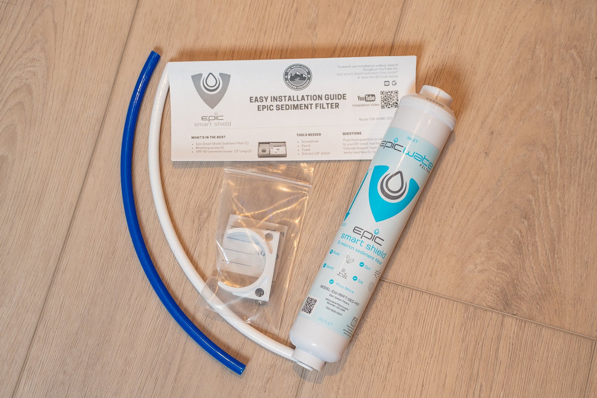 Smart sediment filter kit by Epic Water Filters USA showing a clear filter housing with replaceable sediment filter element inside.