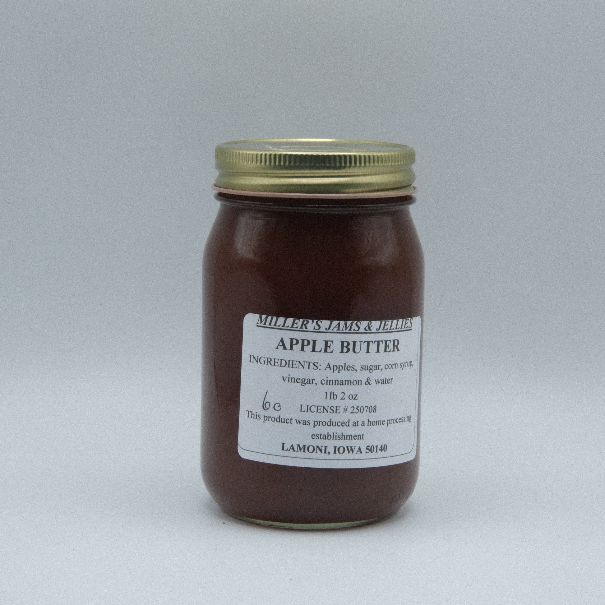 Amish Country Store Miller's Apple Butter jar, homemade Amish jam with rich apple flavor, natural and locally made.