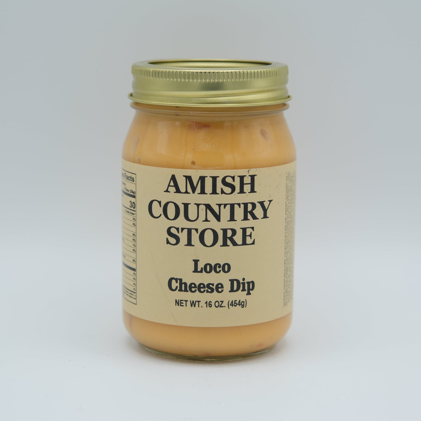 Amish Country Store Loco Cheese Dip 16 oz in a can, creamy cheese dip with a smooth texture, ready for snacking or dipping.