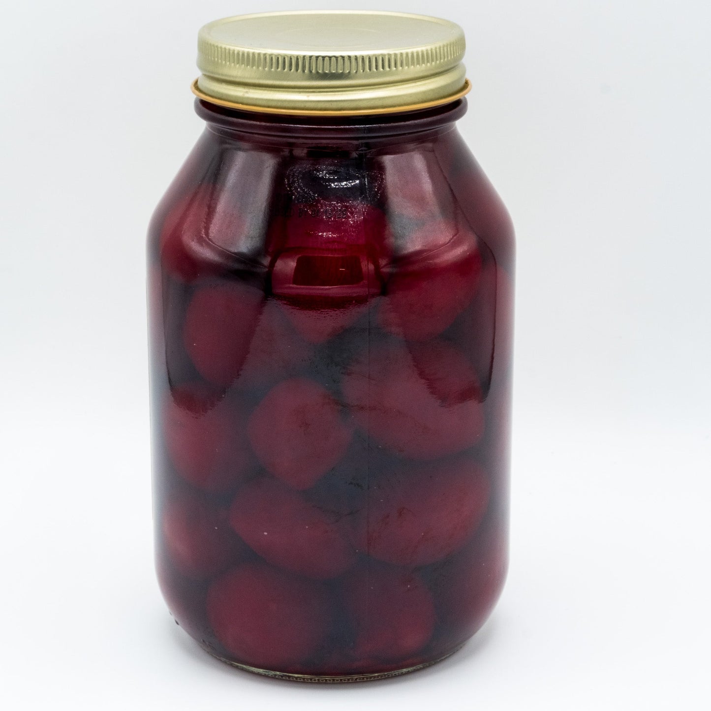 Canned Amish Country Store pickled baby beets in a 32oz jar, showing glossy red beets with pickling liquid inside.