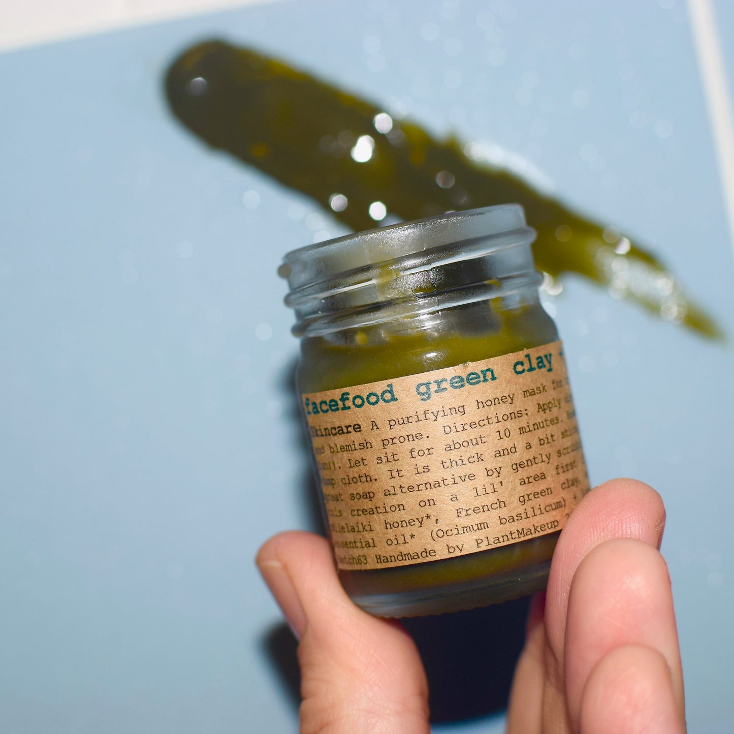 Close-up of Plant Makeup Facefood skin care product in a sleek jar, showcasing natural ingredients and nourishing formula.