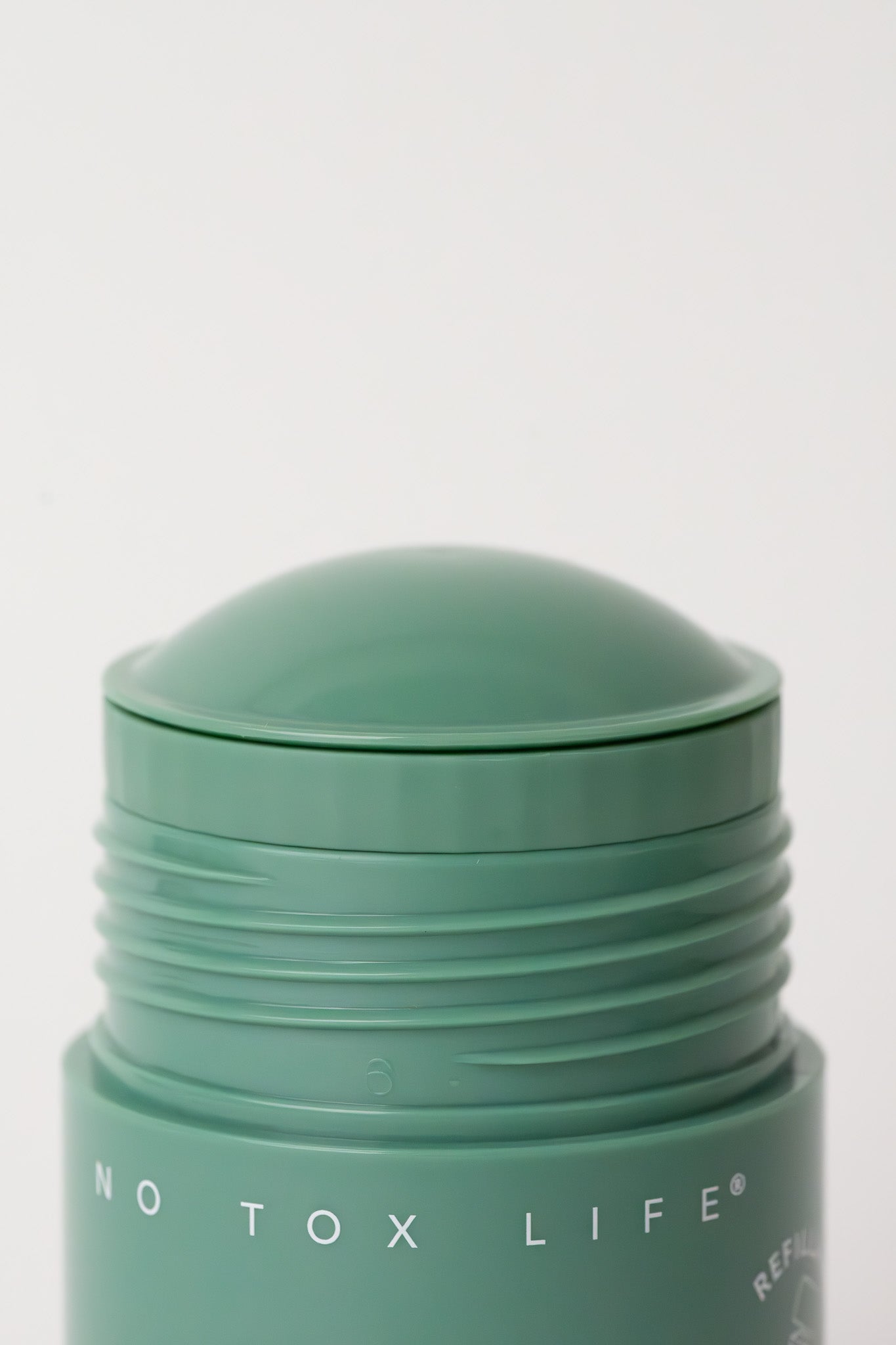 Refillable SOLIDSILK® deodorant stick by NO TOX LIFE, fragrance-free and extra strength, featuring a sleek applicator and natural design.