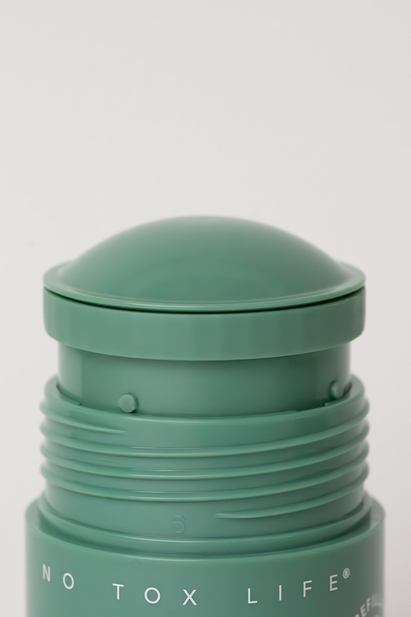 Refillable SOLIDSILK® aloe fragrance-free deodorant stick by NO TOX LIFE, extra strength, shown with sleek packaging.