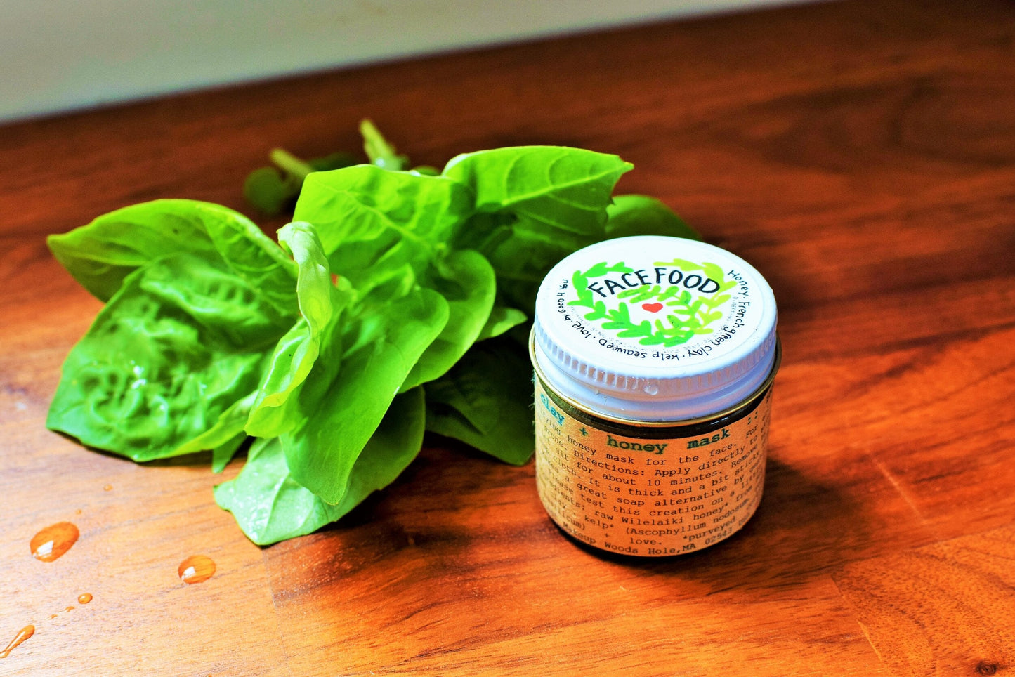 Close-up of Facefood skincare product from plant makeup line, showing the sleek packaging and natural aesthetic.